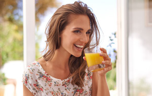 Woman drinking fruit juice