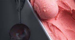 Close-up of low-sugar strawberry ice cream and scoop