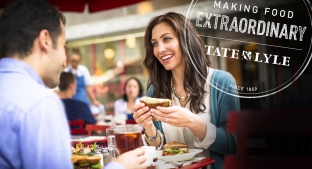 Lady eating a sandwich 