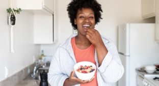 Woman eating cereal 