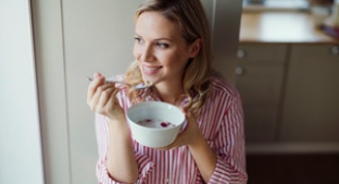 Lady eating cereal