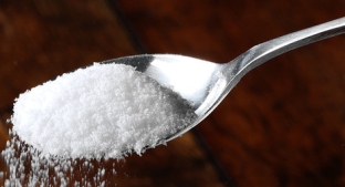 Sucralose on a spoon