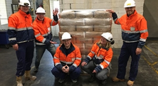 Koog team with pallet of new CLARIA G