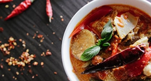 Traditional African cuisine with chillies in a bowl